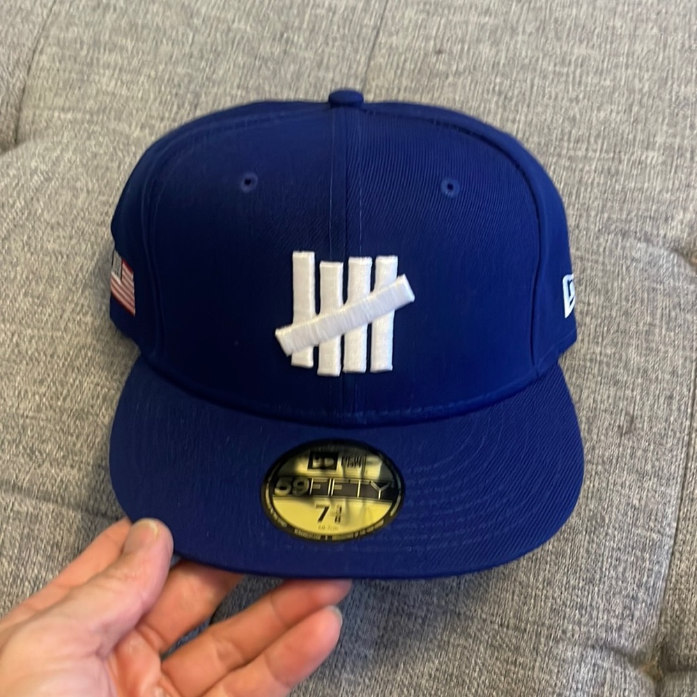 Undefeated fitted blue 7 3/8 NWT.